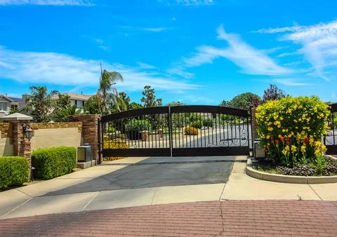 Exit Gate At Secure Housing Subdivision Stock Photos
