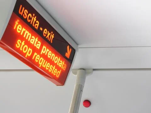 Exit lamp indicator and bus stop request inside a bus Stock Photos