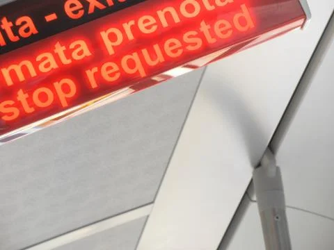 Exit lamp indicator and bus stop request inside a bus Stock Photos