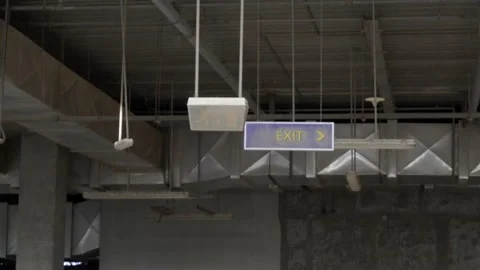 Exit sign in the abandoned building 스톡 동영상 134322269