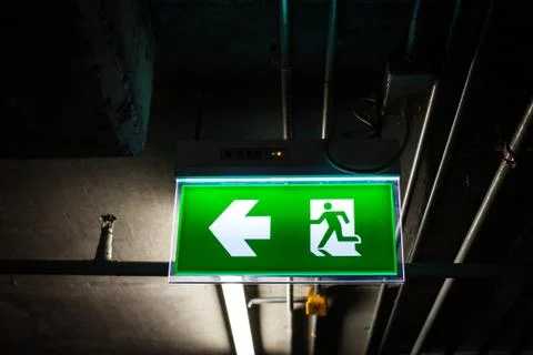 Exit Sign in a building Stock Photos