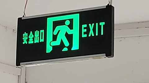 Exit sign hanging in the aisle Stock-Footage 343654978