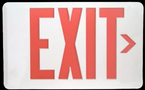 Exit sign isolated on black Stock Photos