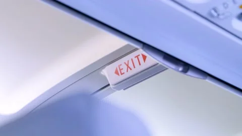 Exit sign of a plane Stock Footage 182888821