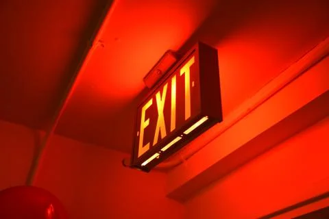 Exit Sign Red Glow Angled Stock Photos
