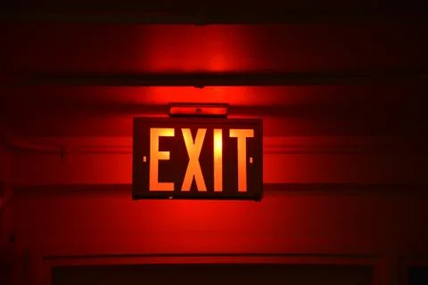 Exit Sign Red Glow Full Face Stock Photos