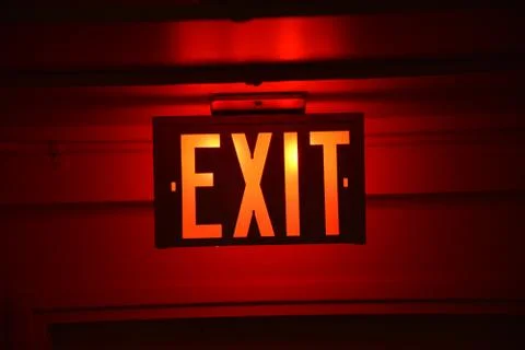 Exit Sign Red Glow Stock Photos