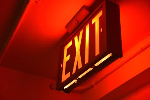 Exit Sign Red Glow Stock Photos