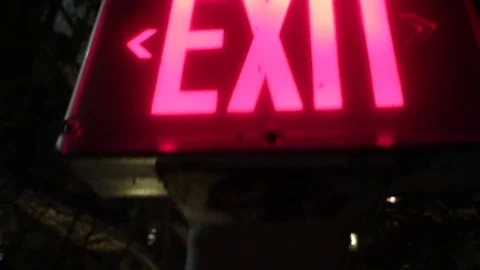 Exit sign tilt dark background Stock Footage 70799059