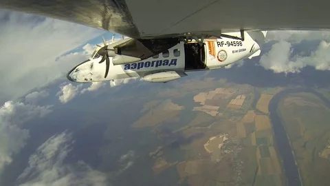 The exit of skydivers . Stock Footage 71225535