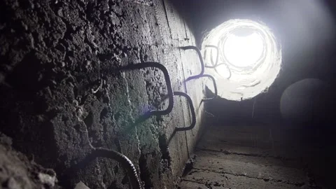 Exit to the surface from the drainage through the manhole. Stock Footage 130351517