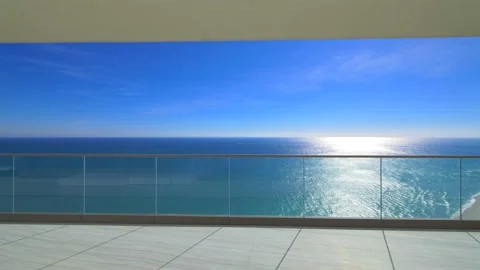 Exit to the terrace overlooking the ocean. View of the ocean and clear sky Stock Footage 149025144