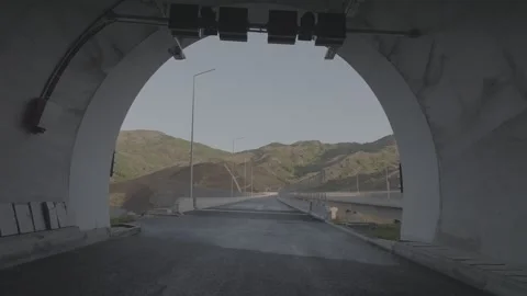 Exit Tunnel Reveal Scenic Mountain Road and Highway Stock Footage 341978006