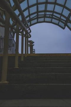 Exit from the underpass in the evening. Cloudy sky. Steps up Stock Photos