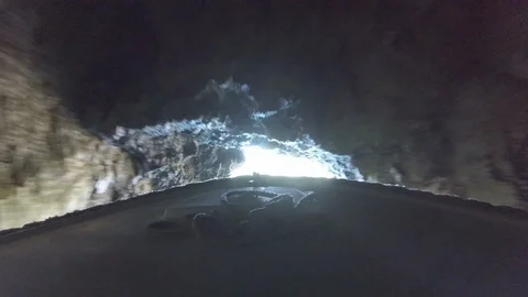 Exiting a tiny cave in Croatia Video stock 113143165