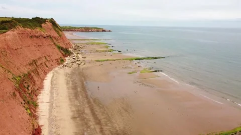 Exmouth at low tide, drone view of the beach and cliffs Stock Footage 159409331