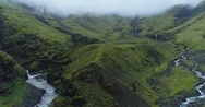 Exotic Aerial Of Foggy Green Mountains And Rivers In Iceland Stock Footage