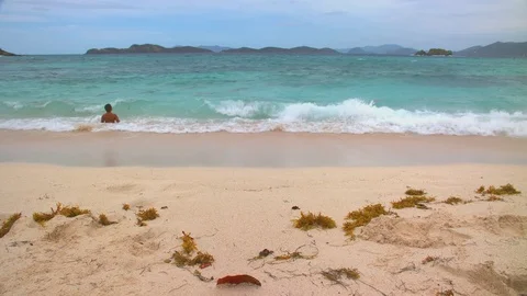 Exotic Beach Scene with Kid Playing in Tropical Water Video stock 75184949