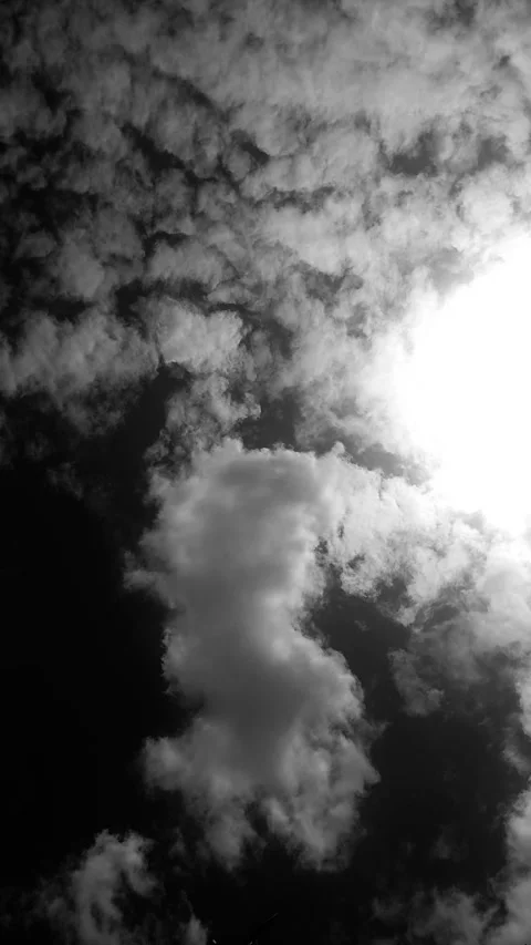 Exotic Clouds with Sunlight, Vertical BNW Stock Footage 296882667