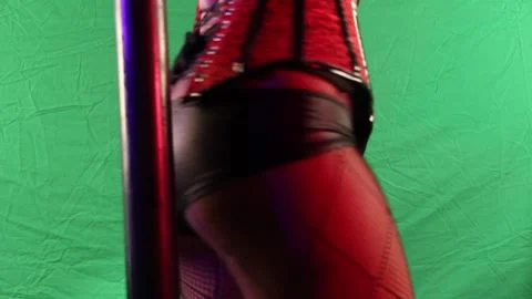 Exotic dancer performing in a vibrant setting Stock Footage 300114372
