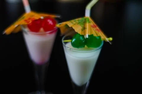 Exotic drink based on Malibu rum and other ingredients, cocktail prepared by  Stock Photos