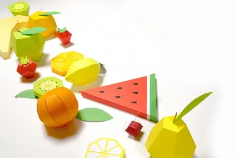 Exotic fruit made of paper on white background. Stock Illustration
