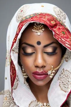 Exotic Indian bride dressed up for wedding Stock Photos