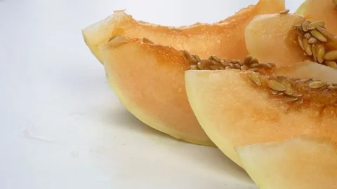 Exotic melon fruit close-up. Sliced melon on a white background 스톡 동영상 121200895