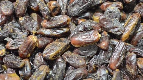Exotic palm dates fruit closeup in the local traditional market. Date fruit, Stock Footage 81112311