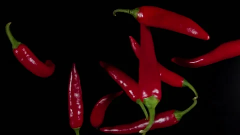 Exotic Spices and chilli pepper Flying up and Falling down in Slow Motion Stock Footage 139447397