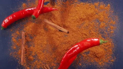 Exotic Spices and red chilli peppers Flying up and Falling down in Slow Motion Stock Footage 147861420