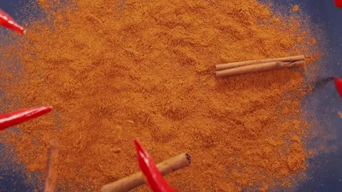 Exotic Spices and red chilli peppers Flying up and Falling down in Slow Motion Stock Footage 147861431