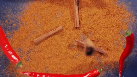 Exotic Spices and red chilli peppers Flying up and Falling down in Slow Motion Stock Footage 147861446