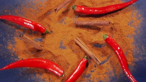 Exotic Spices and red chilli peppers Flying up and Falling down in Slow Motion Stock-Footage 147861447