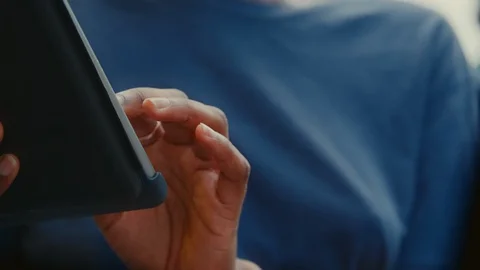 An exotic woman using her touchscreen device while outside at a cafe in Paris. Stock Footage 120542681