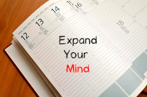 Expand your mind on notebook Stock Photos