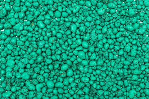 Expanded clay pebbles used as a growing media in hydroponics. Background clos Stock Photos