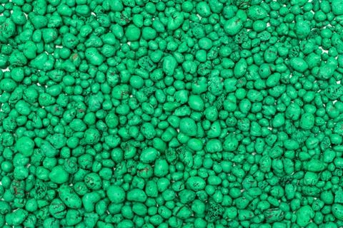 Expanded clay pebbles used as a growing media in hydroponics. Background clos Stock Photos