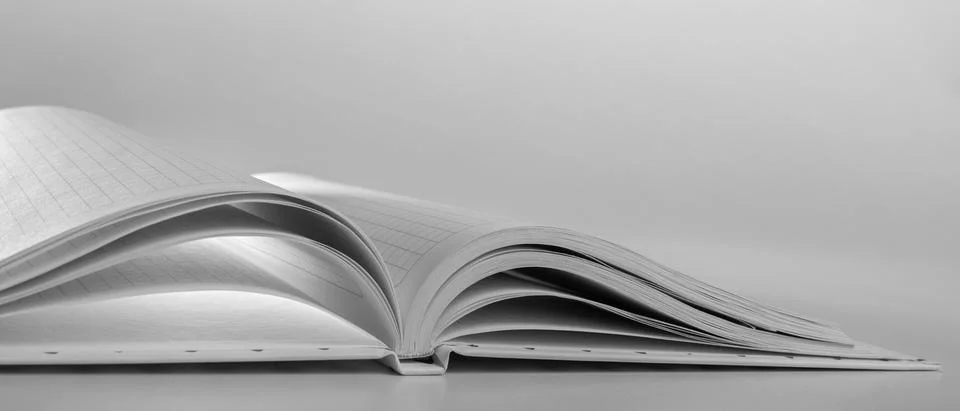 An expanded notebook for notes. Selective focus. Blurred background. Stock Photos