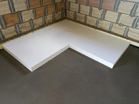 Expanded polystyrene layer on concrete subfloor Stock Photos