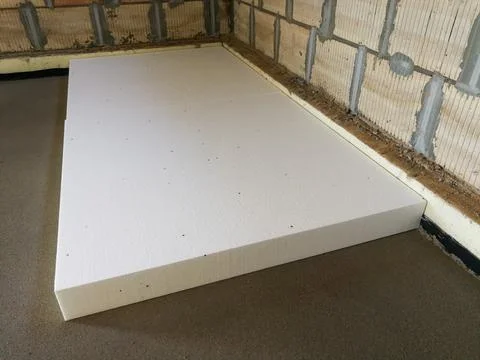 Expanded polystyrene layer on concrete subfloor Foto stock