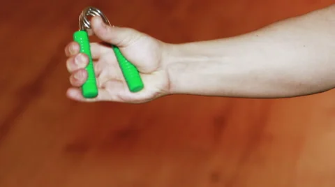 Expander in The Hand Close up Stock Footage 60232085