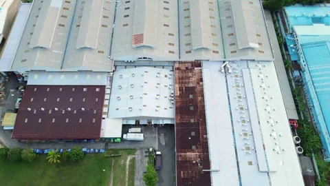 Expansive aerial drone perspective revealing a bustling industrial producti.. Video stock 339031823