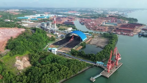 Expansive Aerial Panorama Showcasing a Bustling Coastal Industrial Power Stock-Footage 325191920