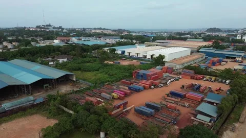 Expansive aerial perspective reveals a dynamic industrial logistics hub wit.. Stock Footage 339035712