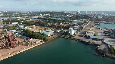 Expansive Aerial Perspective Showcasing a Major Coastal Industrial Zone and.. Video stock 339038124