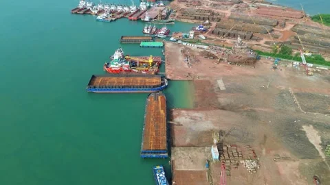 Expansive aerial view of a dynamic coastal industrial zone showcasing exten.. Video stock 325310498