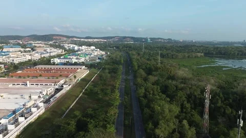 Expansive Aerial View of an Industrial Complex Adjoining Lush Natural Wetla.. Stock-Footage 337243353