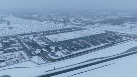 Expansive aerial view of a modern data center complex and surrounding area Stock Footage 328994863