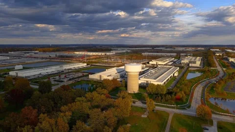 Expansive aerial view of a modern Data center complex and water tower durin.. Stock Footage 329663361